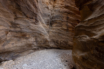 Bizarre natural patterns on mountain walls on the tourist route of the gorge Wadi Al Ghuwayr or An Nakhil and the wadi Al Dathneh near Amman in Jordan