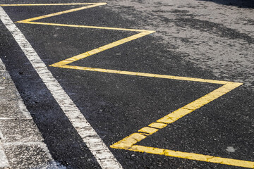 Yellow and white zig zag road line markings generally provide motorists with instructions that...