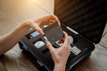 A technician works with a demo kit of the smart home system