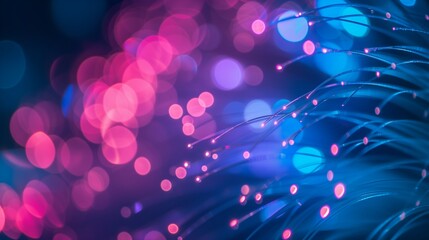 a close-up macro image of multicolored vibrantly glowing optical fiber. Abstract background