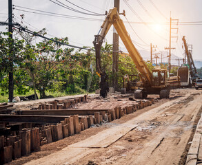 Big road construction site with special machinery in the construction area