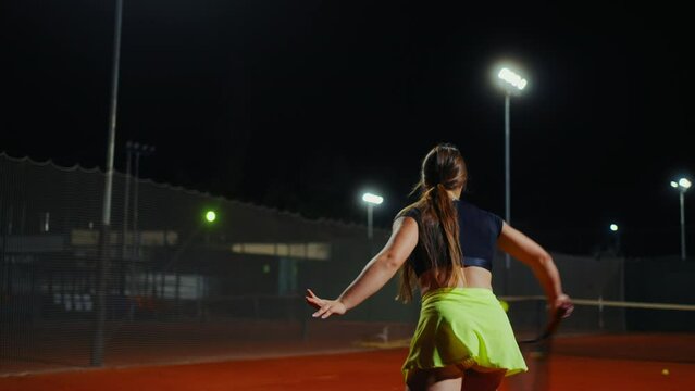 Mixed Race Female Tennis Player Training On Court, Slow Motion Shot, Portrait, Fitness Workout