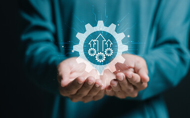 Process to increase productivity concept. Person holding virtual productivity icon for industrial management in efficiency and efficient process. Lean cost and productivity growth.
