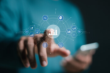 Big data analytics and business intelligence concept. Businessman touch virtual chart and graph icons.