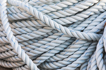 Close up of ropes piled near the port