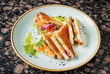 tasty sandwiches with ham and fish