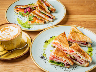 tasty sandwiches with ham and fish