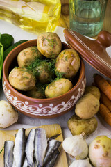 Boiled potatoes with sprat and herbs, Ukrainian cuisine, local food, Odessa cuisine