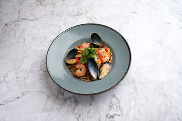 Seafood Udon noodles with shrimp and mussels