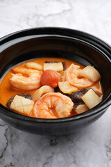 Tom yum soup with shrimp and rice bowl