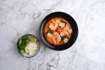 Tom yum soup with shrimp and rice bowl