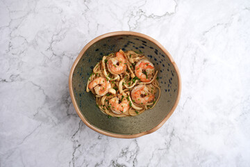 Obraz na płótnie Canvas Ramen noodles with shrimp in a bowl.