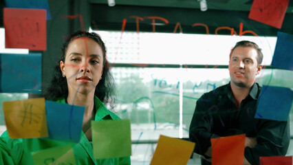 Professional business people discuss about creative marketing idea in modern office. Business team...