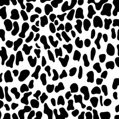 Abstract animal skin leopard, cheetah, Jaguar seamless pattern design. Black and white seamless camouflage background.