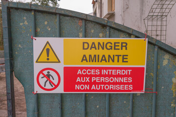 danger amiante acces interdit aux personnes non autorisees french panel sign text means asbestos danger access prohibited to unauthorized persons - obrazy, fototapety, plakaty