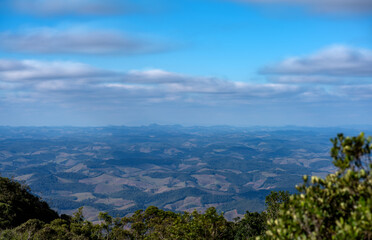 Fototapeta na wymiar Majestic mountain landscape with blue sky and fluffy clouds