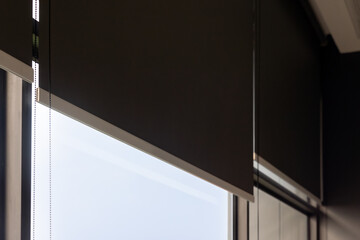 blind curtain or black blinds Roller sun protection in office.