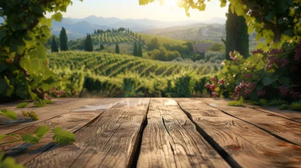 Papier Peint photo Toscane An empty wooden table for product display. Blurred french vineyard in the background