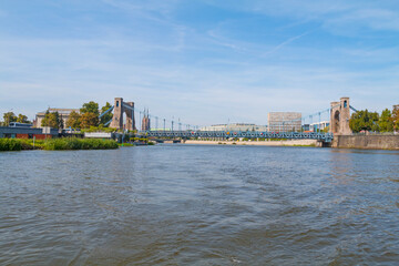 A view from a boat sailing on the Odra River. The view to the Peace Bridge. Peace Bridge is located...