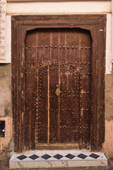 An old wooden door in the medina, Marrakech city, Morocco