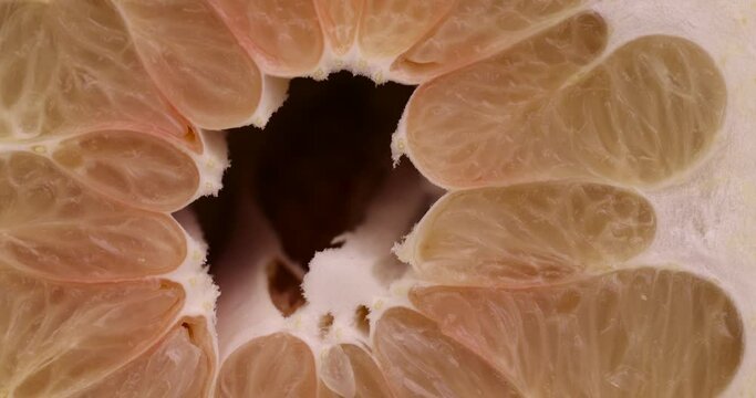 Chunks of ripe pomelo close-up, fresh fruit pomelo ready to eat