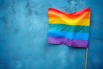 a rainbow flag on a blue background