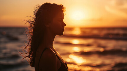 silhouette of a woman in sunset