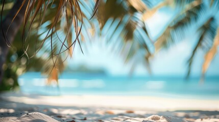 Summer exotic sandy beach with blur palms and sea on background - obrazy, fototapety, plakaty