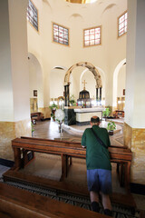 Praying Man in the Church of the Beatitudes, the traditional place where Jesus gave the Sermon on the Mount, Galilee, Israel