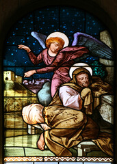 Obraz na płótnie Canvas The Dream of Saint Joseph, stained glass window in the Church of Saint Joseph in Nazareth, Israel
