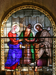 Fototapeta premium Engagement of the Virgin Mary, stained glass window in the Church of Saint Joseph in Nazareth