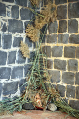 A baby Jesus figure on Christmas, Church of the Primacy of St Peter., Sea of Galilee, Tabgha, Israel