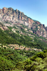 Fototapeta na wymiar The Village of Ota on Corsica, Set in a Hillside in the Mountains Near the Gulf of Porto