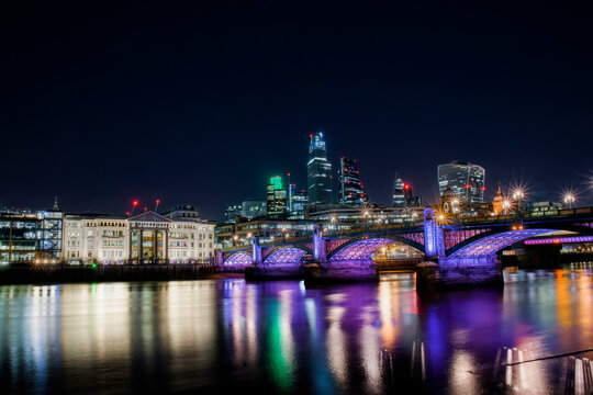 Southwark Bridge Crossing the River Thames in London, Linking the Districts of Southwark and City of London, Lit up at Night