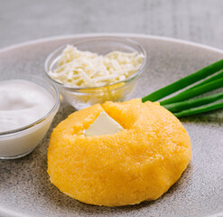 polenta with onions, feta cheese and sour cream