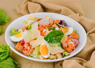 Chicken and shrimp caesar salad top view