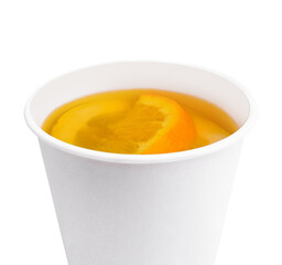 tea with orange slices in a plastic cup