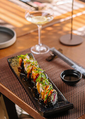 Japanese unagi eel grilled sushi maki roll cutting