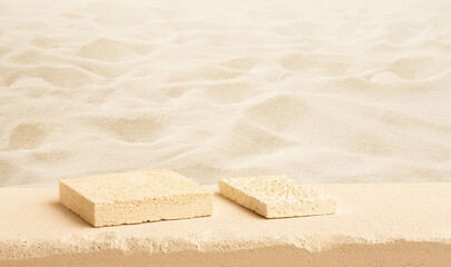 Selective focus.top sandstone product display platform with sand beach background. podium stand and...