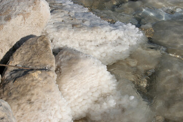Crystallized salt rocks along the shores of the Dead Sea, Israel - 733022035