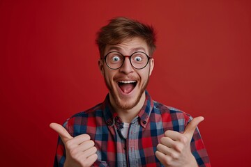 a man with glasses and a red background - obrazy, fototapety, plakaty