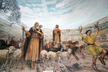 A mural in the Church of the Shepherds` Field near Bethlehem, depicting shepherds rejoicing when...