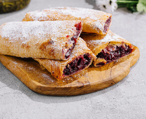 flaky puff pastries, filled with sweet cherry filling