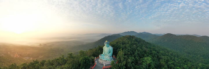 Aerial view of The Great Buddha at Doi Phra Chan is a towering bronze Buddha statue that can be...