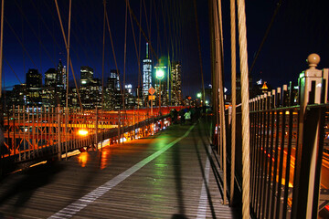 Panoramic view on Brooklyn bridge by night, New York, USA