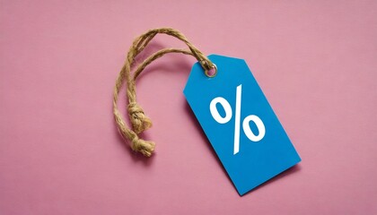 percent symbol on the blue price tag pink background