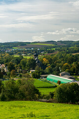 Kurbitz village with rolling landscape around in Saxony during early autumn