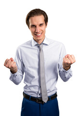 Fototapeta premium Smiling businessman clenching fists in excitement, isolated on white. Career achievement concept