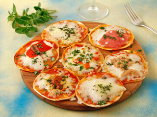 Assorted minipizzas.