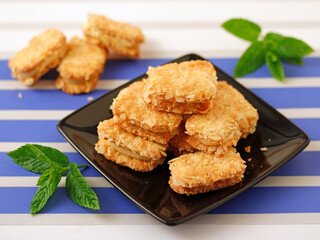 Almond cookies with custard.